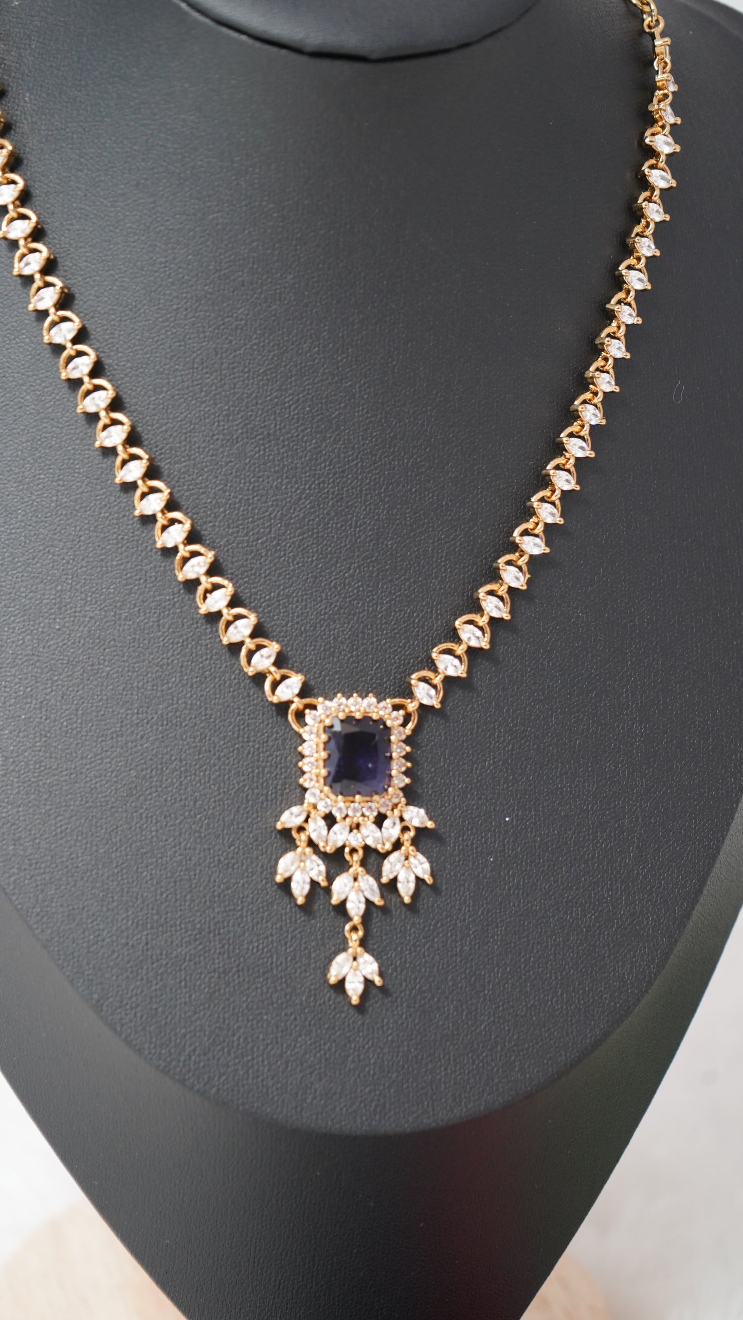 Elegant necklace with matching earrings, crafted with royal purple ruby stone