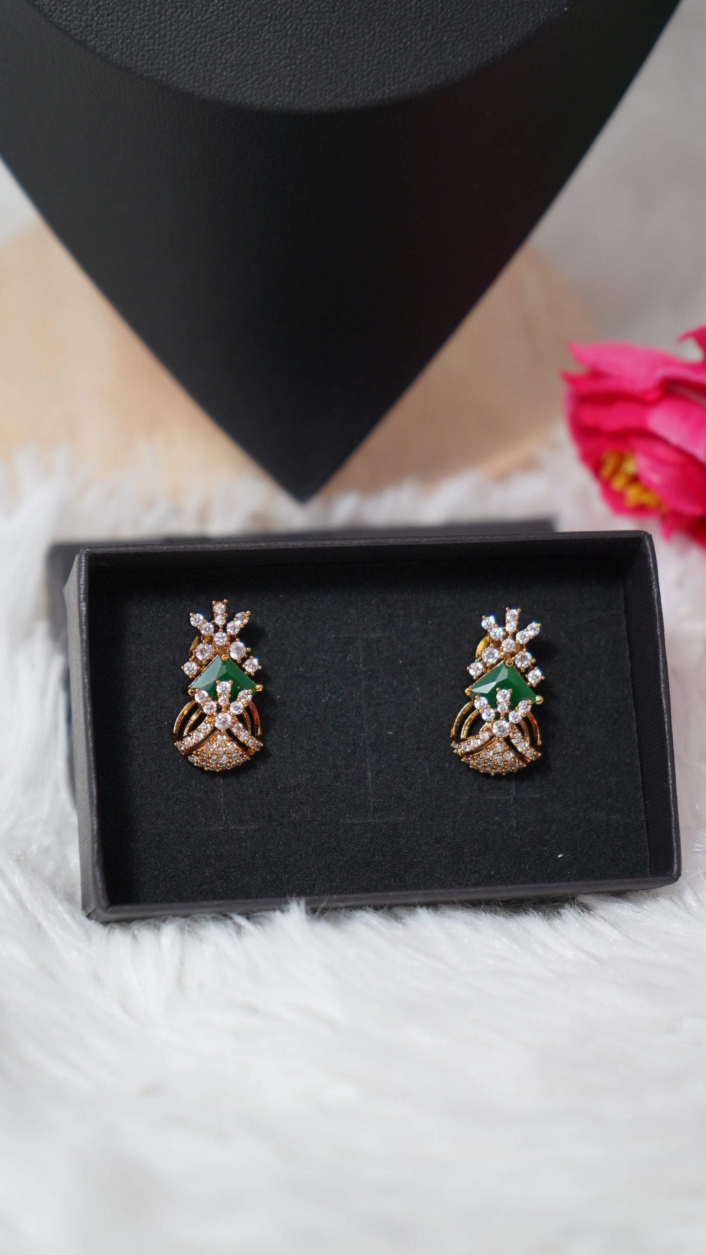 Modern short mangalsutra chain with earrings accented with green stone