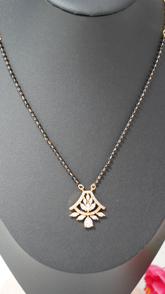 Timeless black beads mangal sutra chain with micro gold plating and white stone accents