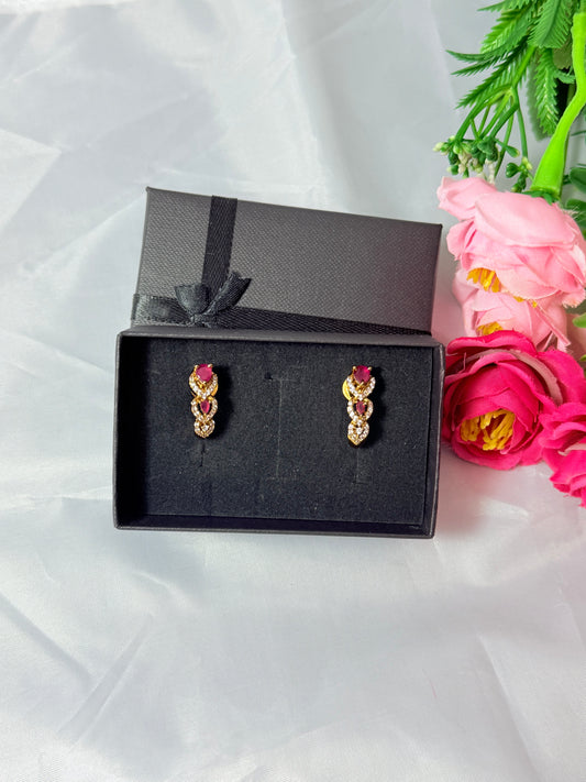 Small stud earrings with pink & gold finish