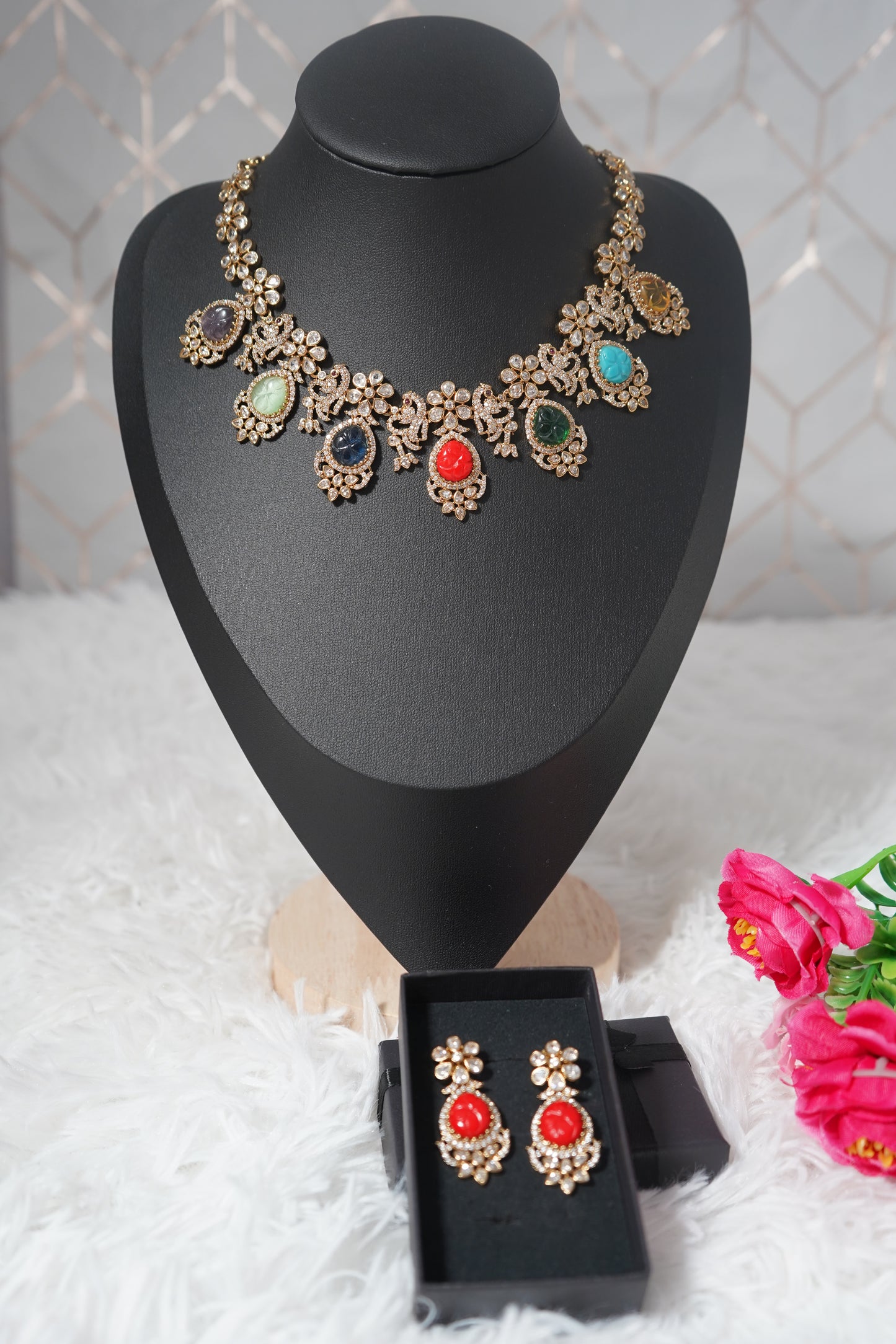 A vibrant Navratna necklace set crafted with Victorian polish