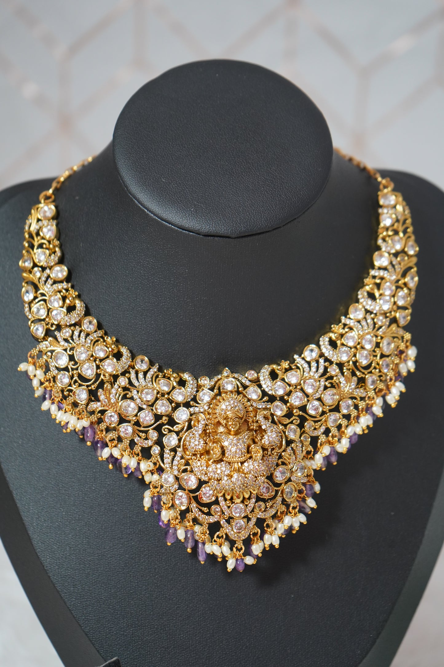 Purple choker-style necklace set with micro gold plating and a divine god motif
