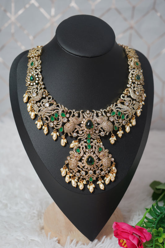 Bridal necklace set with elephant designer stones in a rich green tone