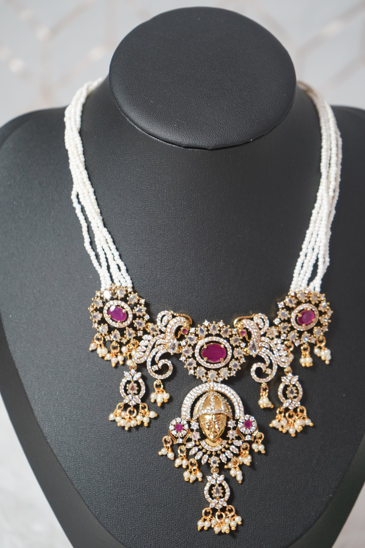 White beads with gold-plated necklace set temple inspired detailing- white