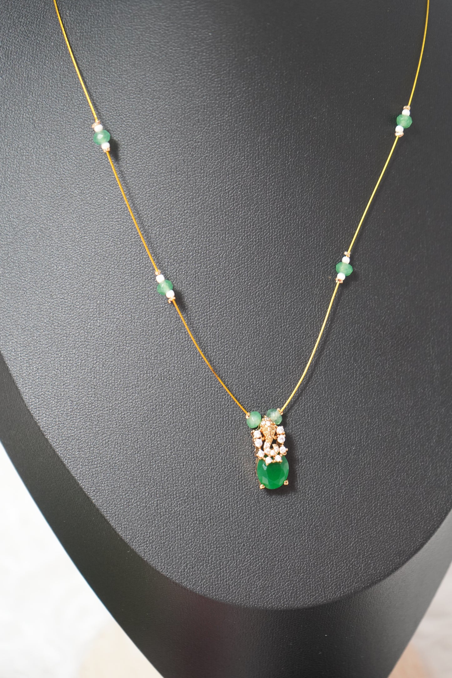 Gold-plated invisible chain adorned emerald green stone with Earrings - Green