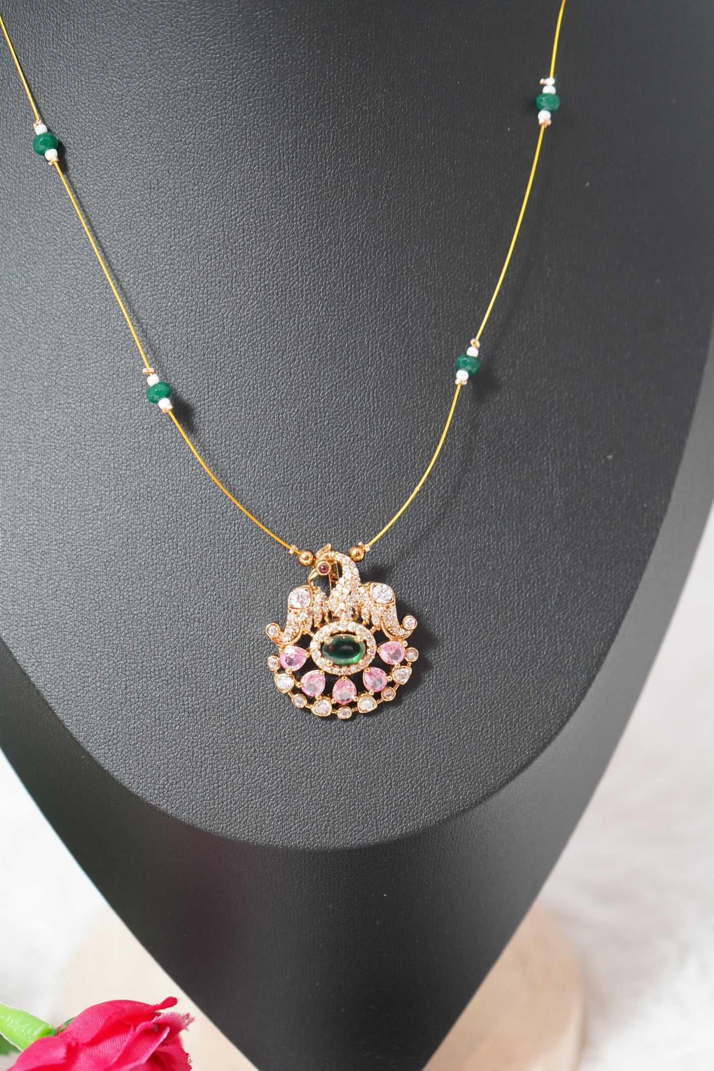 Gold-finish invisible chain with elegant peacock detailing with matching earrings - Green