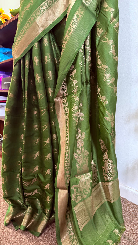 Kanchi Banarasi Saree with pink stitched bird motif blouse - Green & Pink