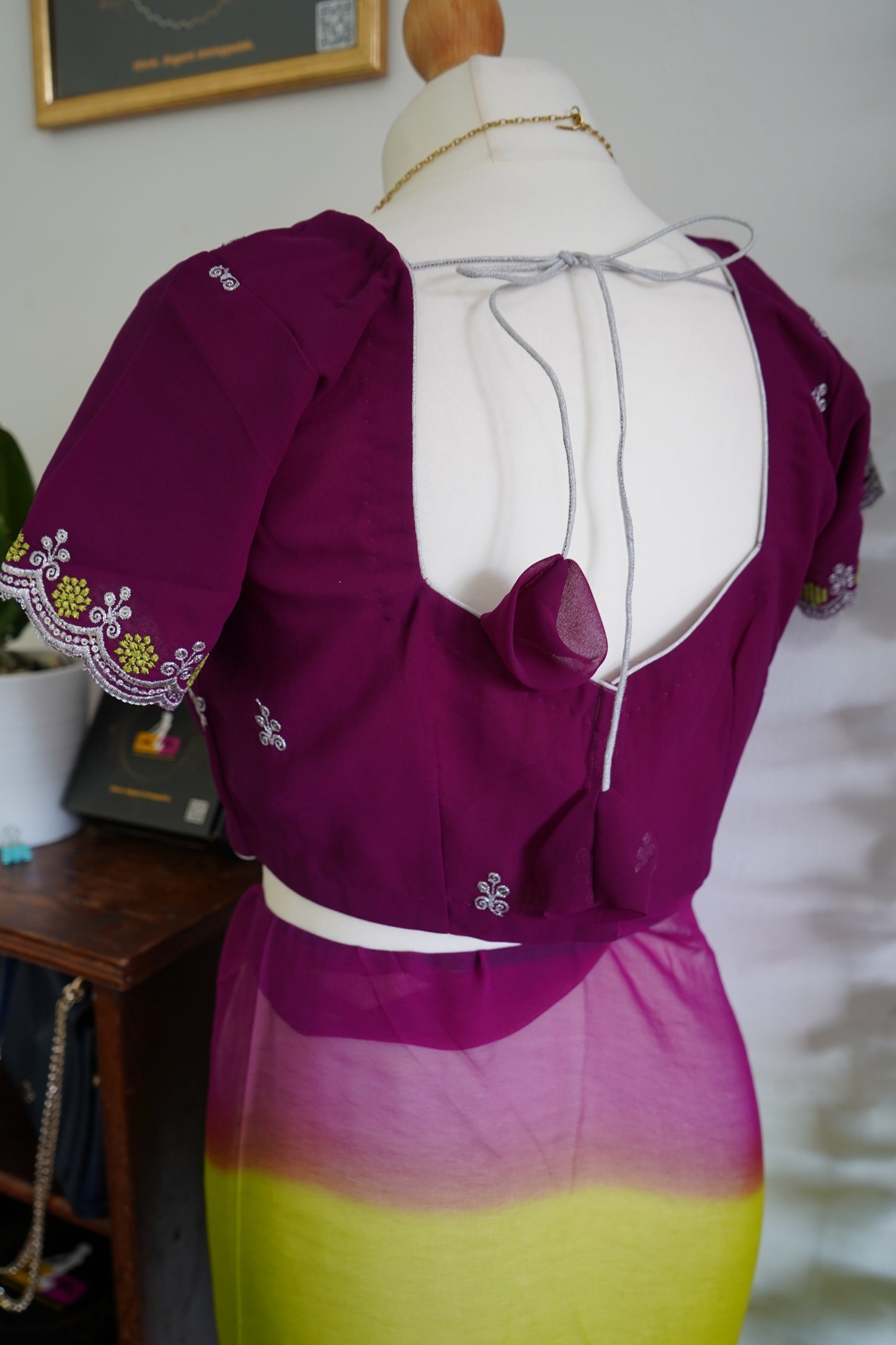 Georgette dual shade cut work border detailing with stitched blouse - Green & Purple