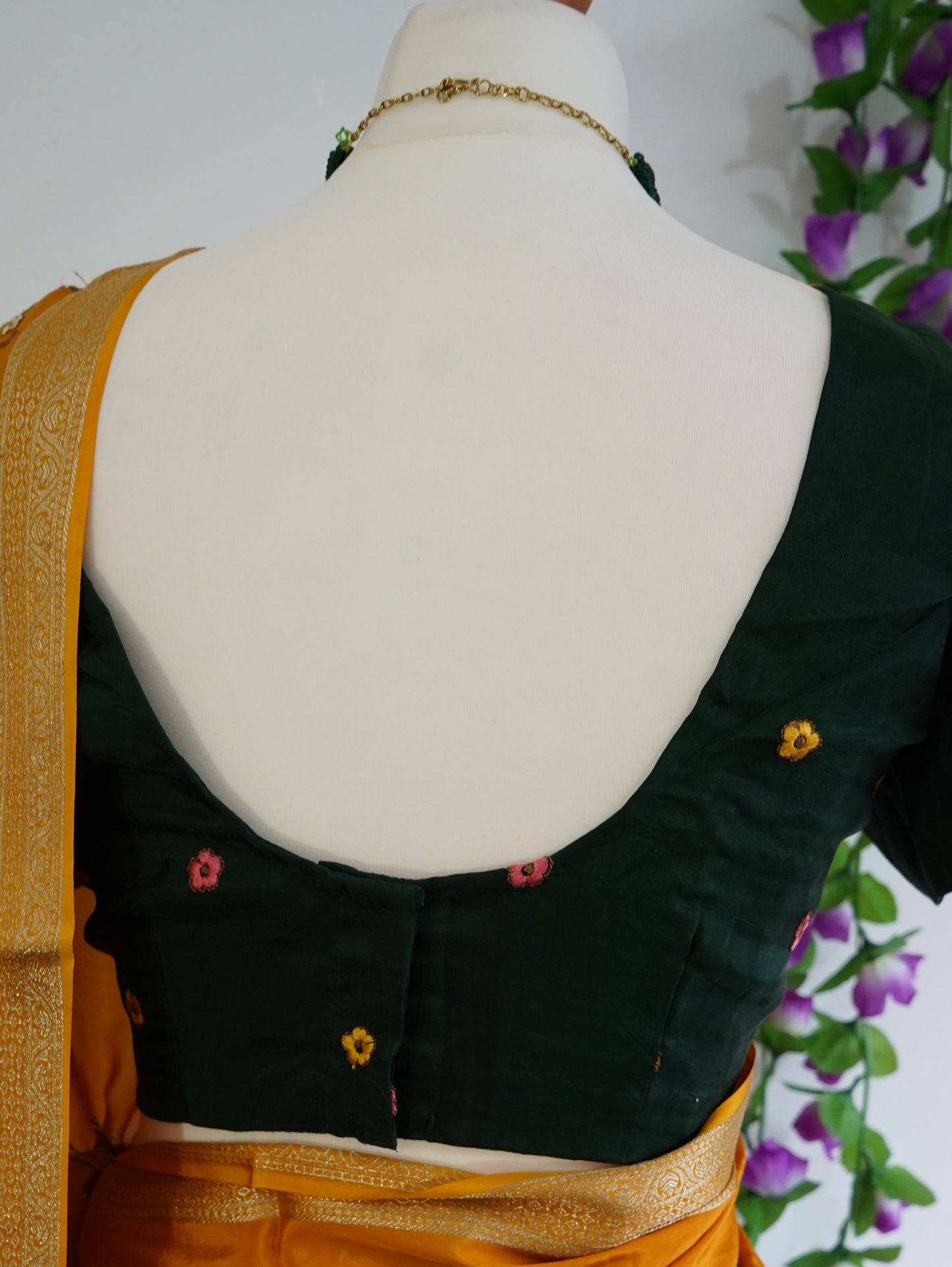 Mysore crepe silk saree with green stitched embroidered blouse - Orange, & floral zari motifs