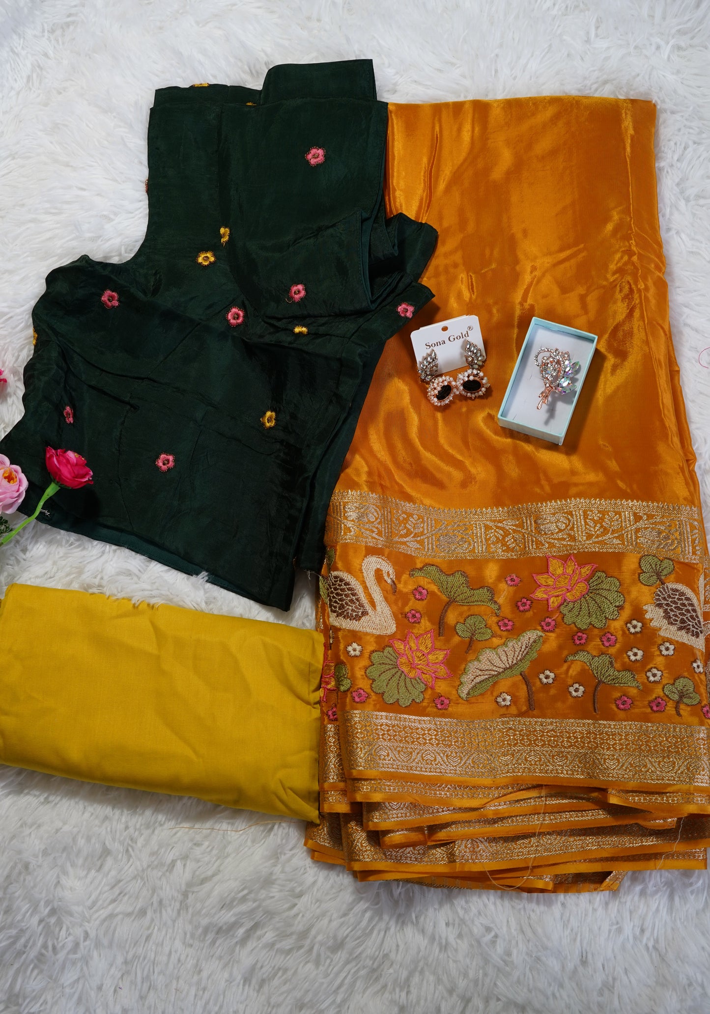 Mysore crepe silk saree with green stitched embroidered blouse - Orange, & floral zari motifs