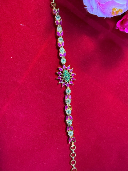 Gold-Finish Pink Kundan Bracelet with Intricate Meenakari Detailing