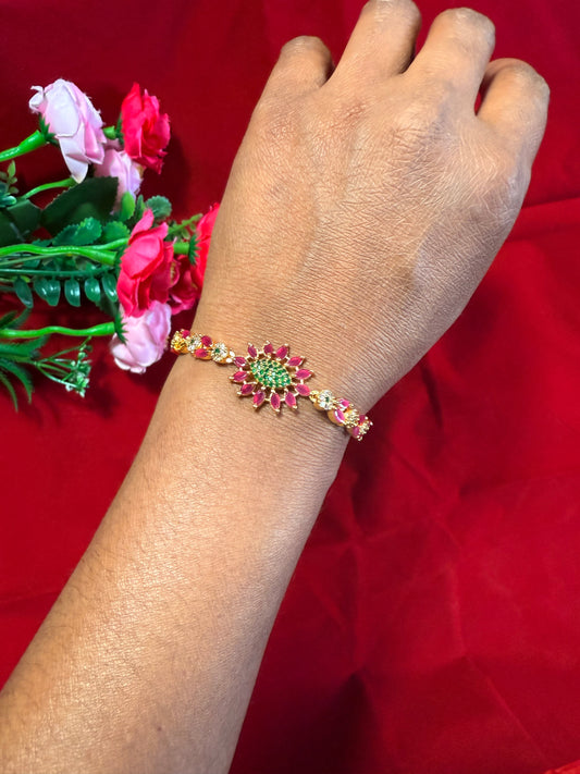 Gold-Finish Pink Kundan Bracelet with Intricate Meenakari Detailing