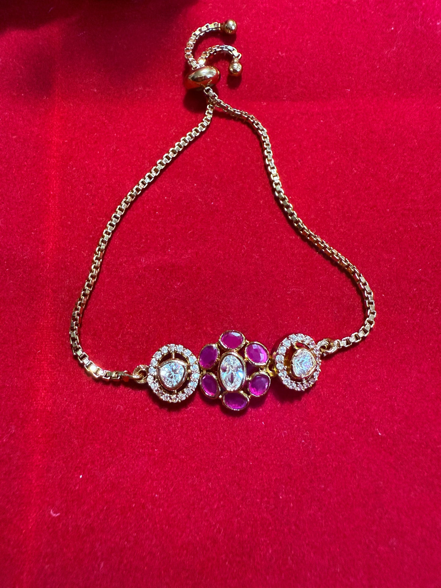 Gold-Finish Pink Kundan Bracelet with Intricate Meenakari Detailing