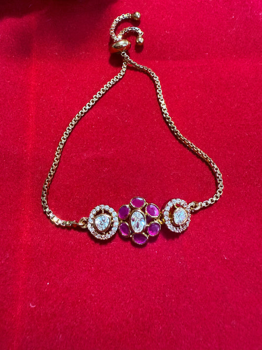 Gold-Finish Pink Kundan Bracelet with Intricate Meenakari Detailing