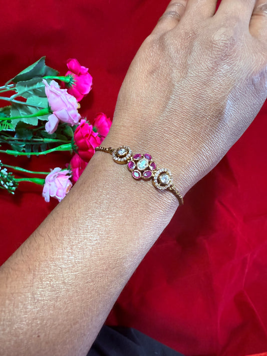 Gold-Finish Pink Kundan Bracelet with Intricate Meenakari Detailing