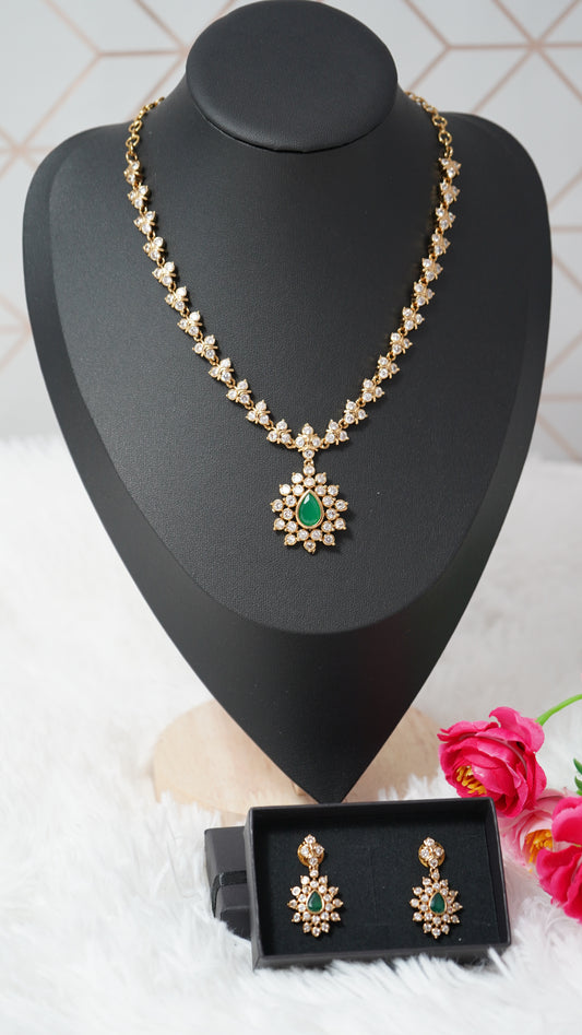 Classic necklace set with matching earrings in Green & rich gold finish