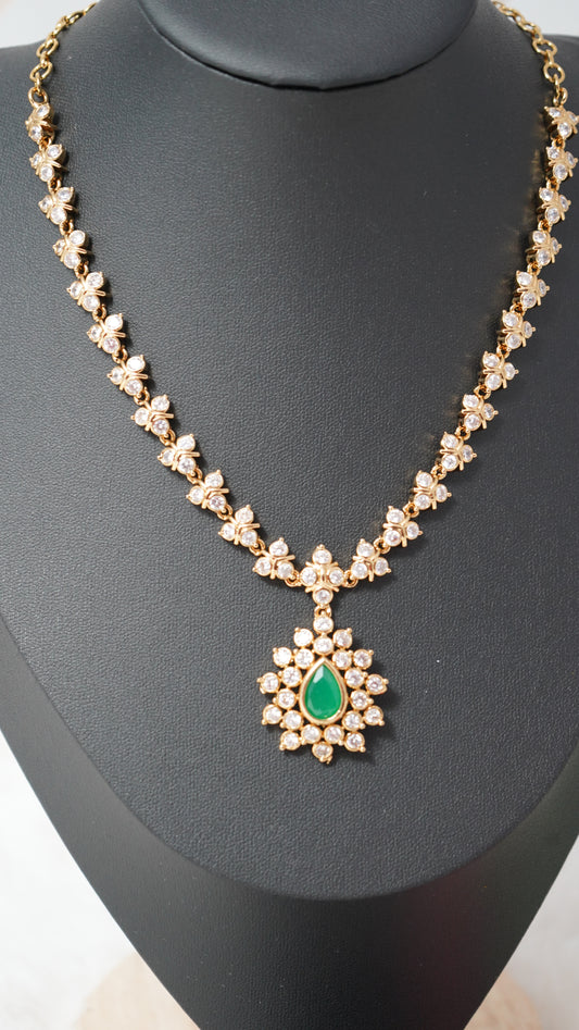 Classic necklace set with matching earrings in Green & rich gold finish