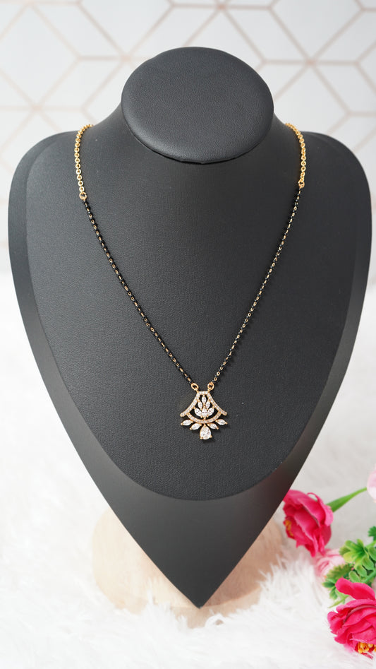 Timeless black beads mangal sutra chain with micro gold plating and white stone accents