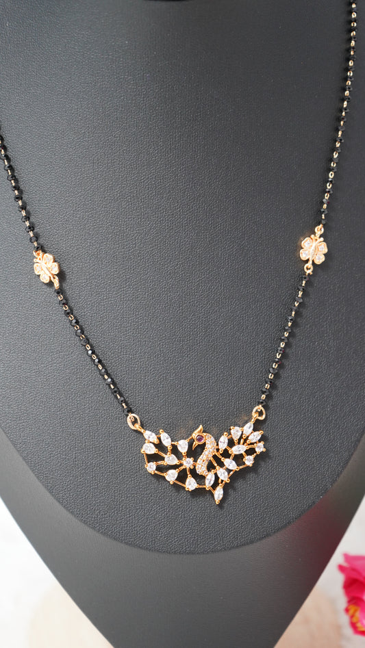 Short elegant black beads chain with peacock pendant