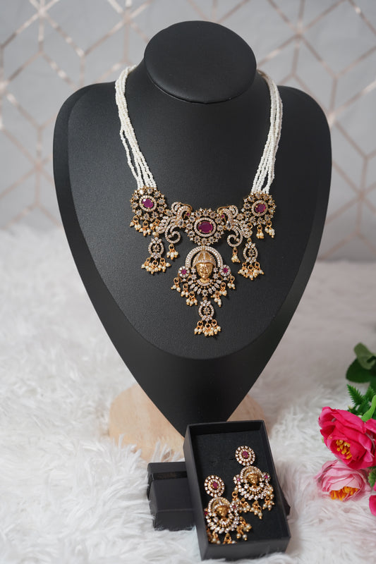 White beads with gold-plated necklace set temple inspired detailing- white