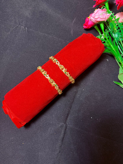 Gold Finish pair Bangles-Peacock Detailing