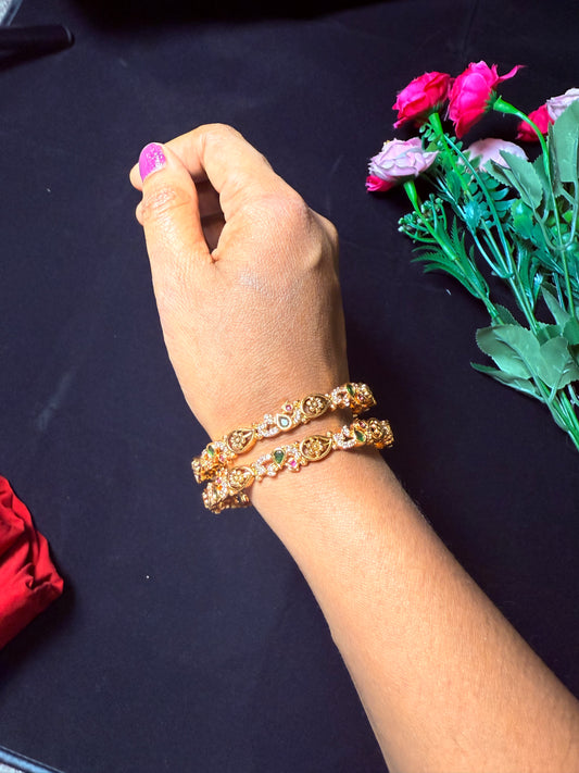 Gold Finish pair Bangles-Peacock Detailing