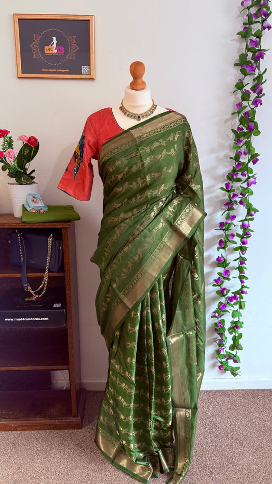 Kanchi Banarasi Saree with pink stitched bird motif blouse - Green & Pink