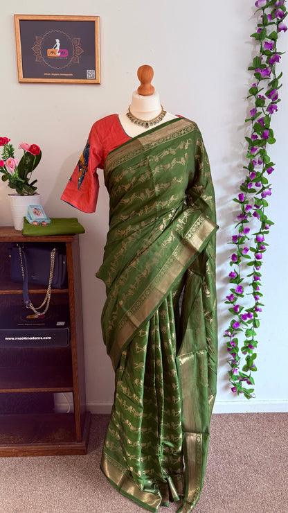 Kanchi Banarasi Saree with pink stitched bird motif blouse - Green & Pink