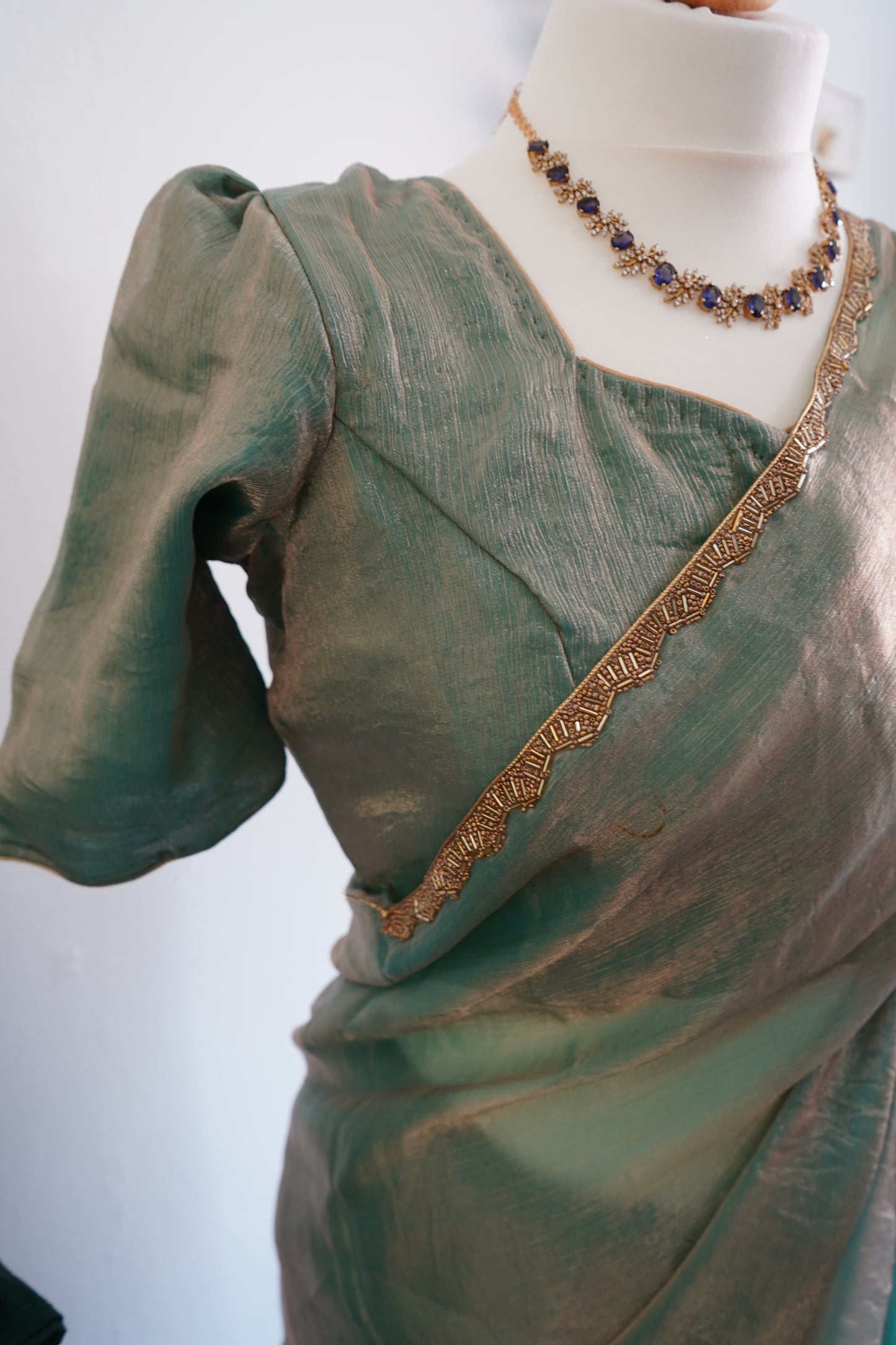 Shimmery Chiffon Saree with beads work lace border with stitched blouse - Green